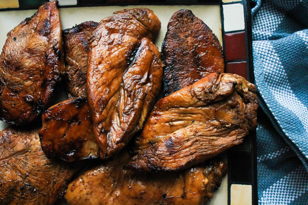 marinated grilled chicken on a plate 