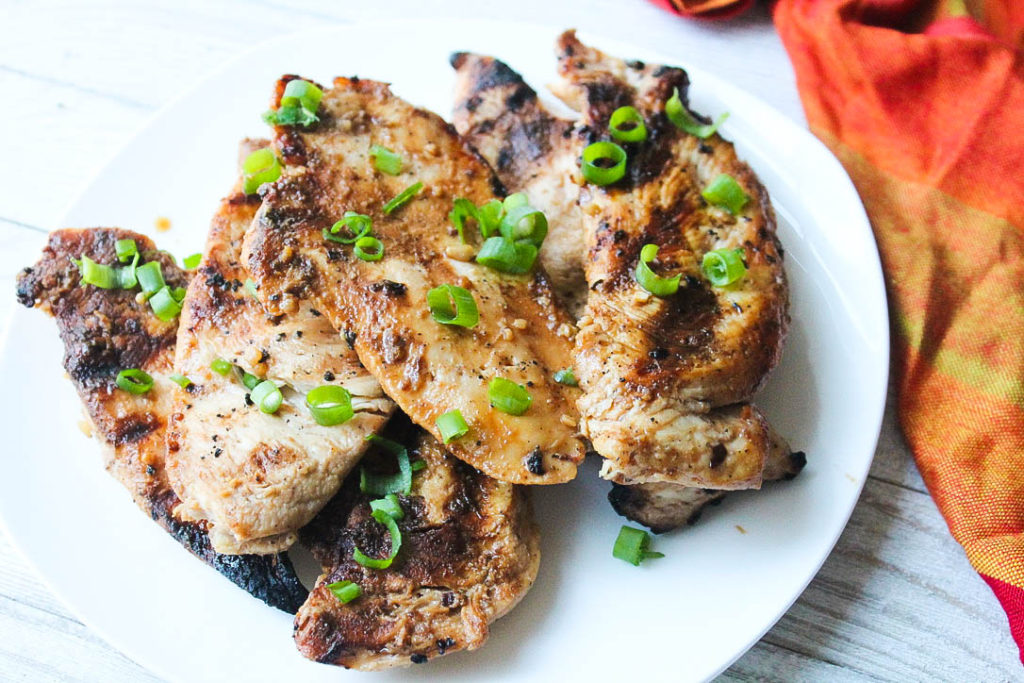 sesame ginger grilled chicken topped with green onions 