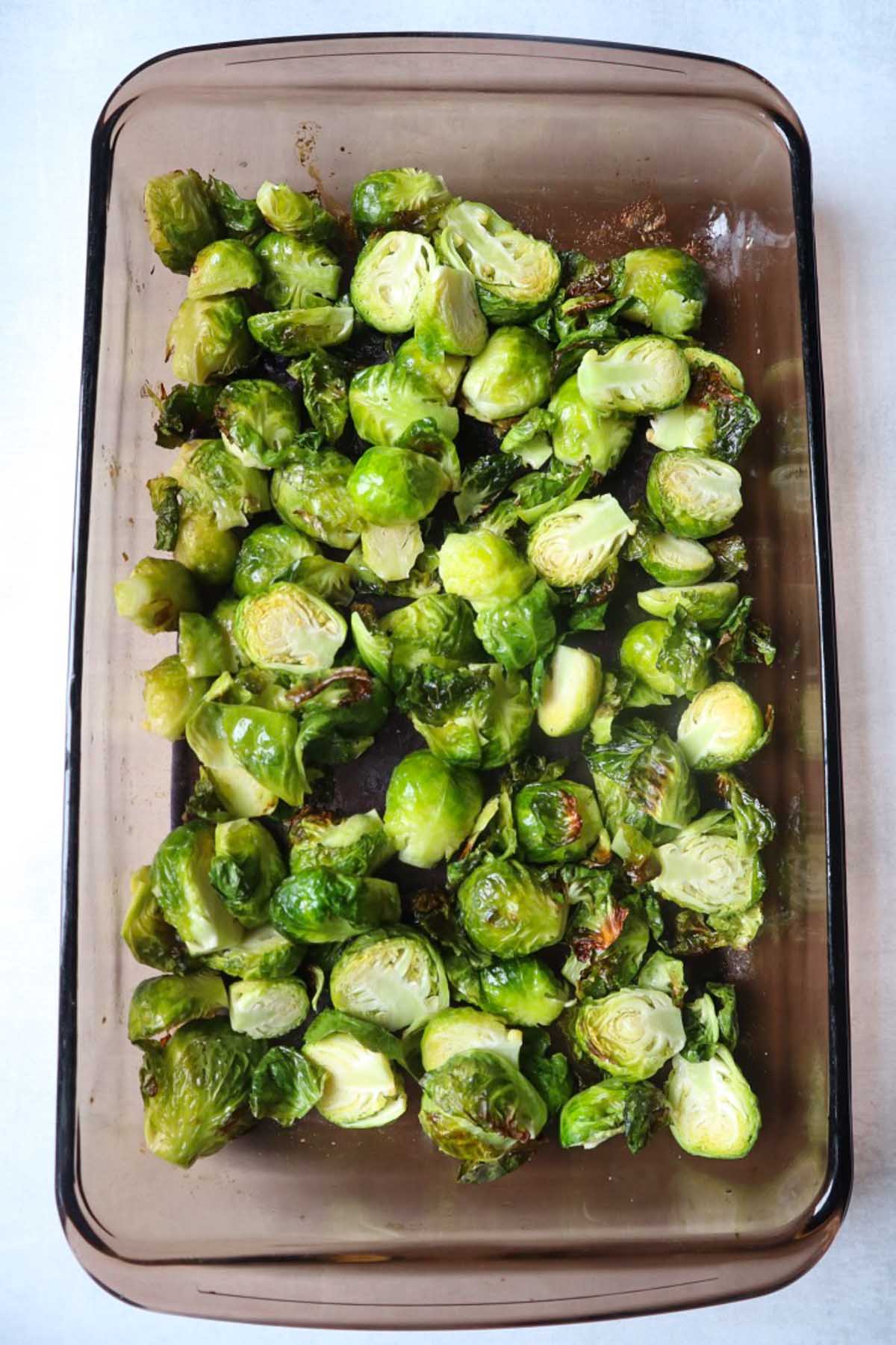 sliced brussel sprouts in a glass dish