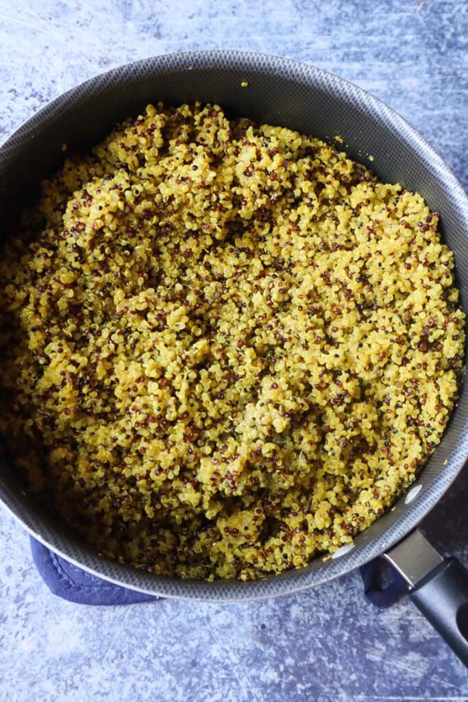 sauce pan with cooked quinoa