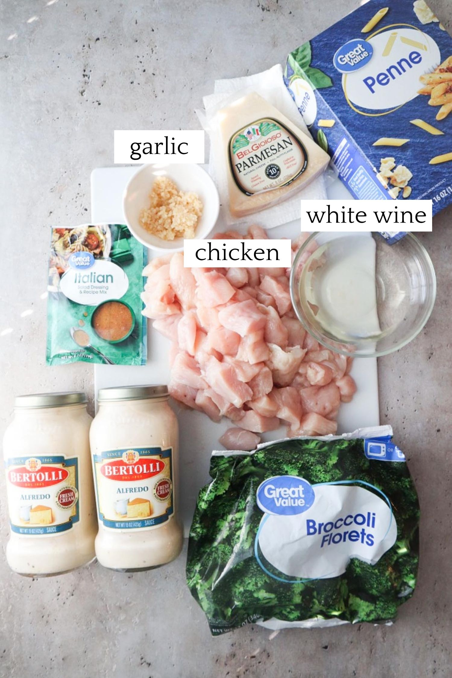labeled ingredients to make crock pot chicken alfredo with broccoli.