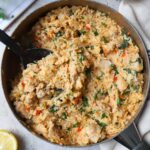 skillet with creamy cajun chicken and rice.