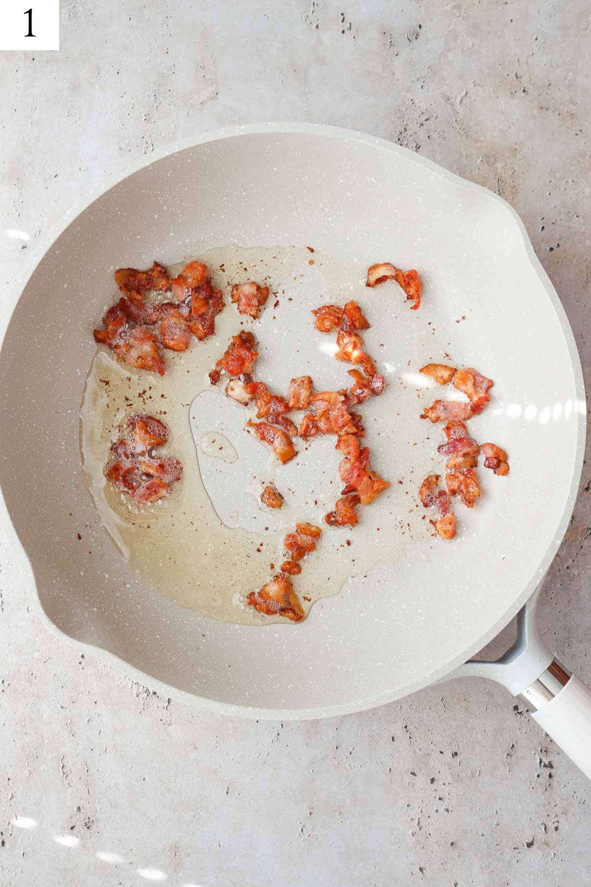 skillet with crispy bacon.