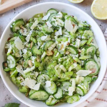 white bowl with celery cucumber salad.