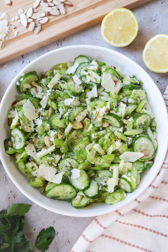 white bowl with celery cucumber salad.