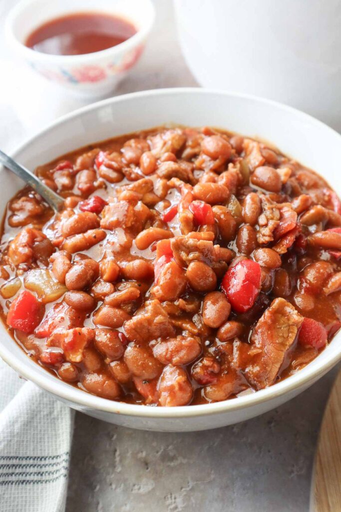 white bowl with brisket baked beans.