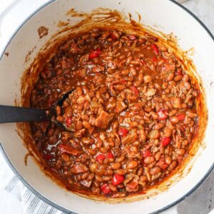 brisket baked beans in a dutch oven.