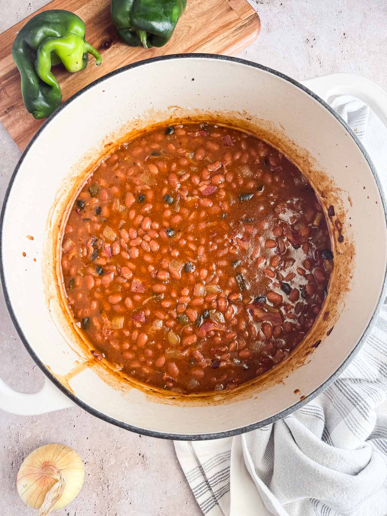 dutch oven with maple baked beans with bacon.