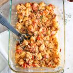 glass baking dish with fully baked feta gnocchi.