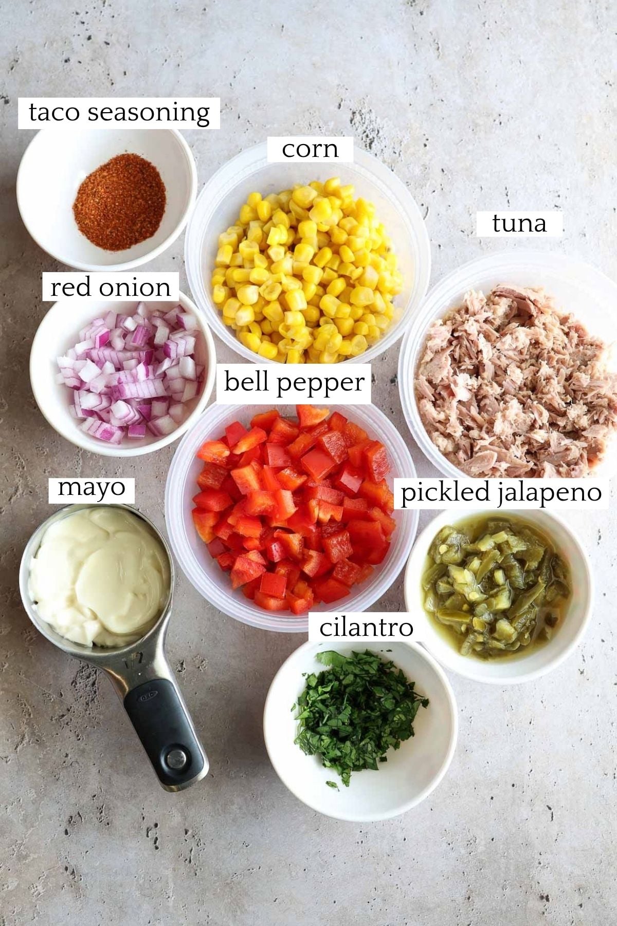 labeled and measured ingredients to make tuna corn salad.